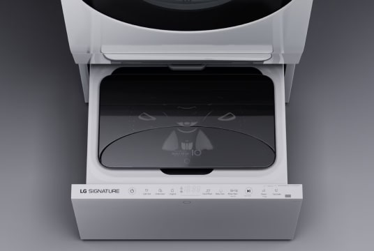 An angled, top-down image showing the TwinWash drawer in an open position.