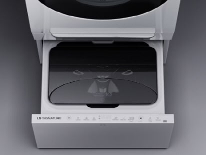 An angled, top-down image showing the TwinWash drawer in an open position.