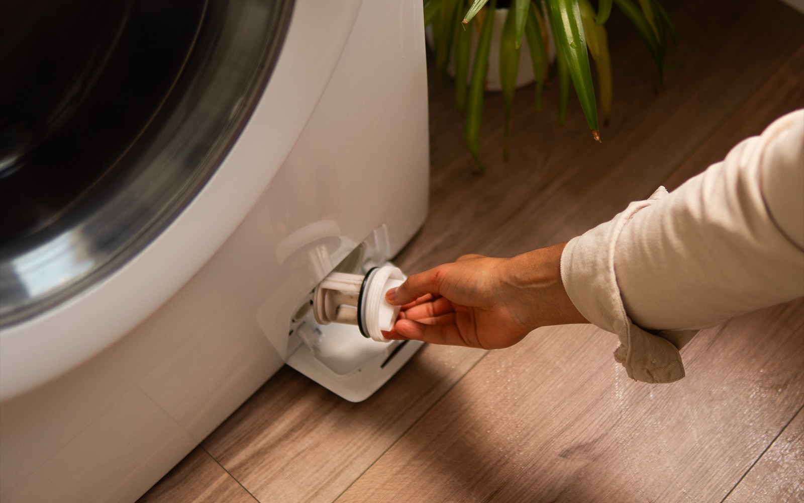 locatie afvoerpomp filter lg wasmachine