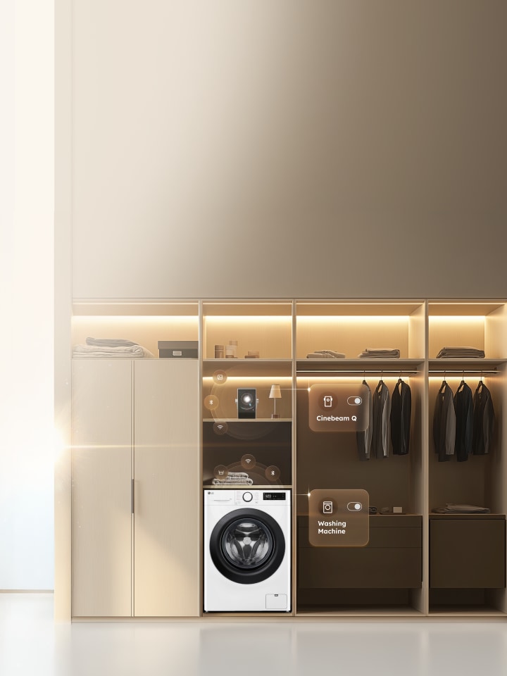 smart wardrobe with an lg washing machine and neatly positioned items on the shelves with some brown toned clothing hanging in the opened wardrobe