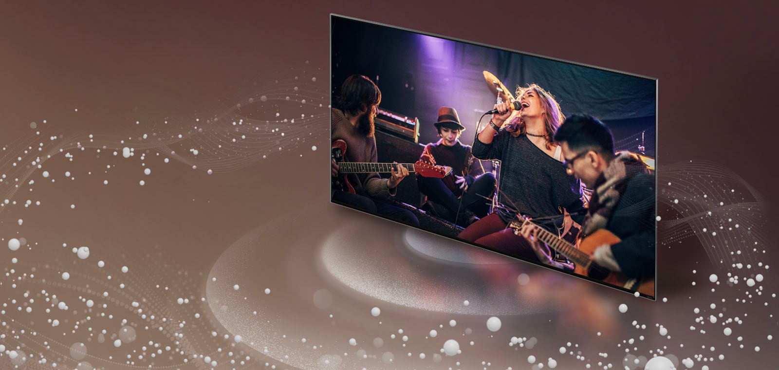 LG TV as sound bubbles and waves emit from the screen and fill the space.