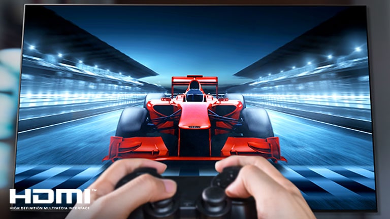 A close up of a player playing a racing game on a TV screen. On the image, there are HDMI logo on the bottom left and 1ms Response Time logo on the bottom right.