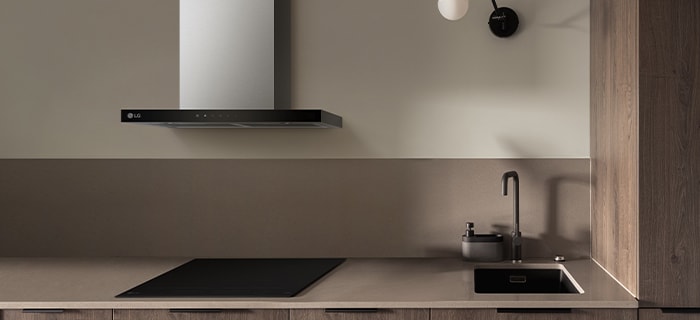 This is an image of LG built-in induction hob and hood installed in the kitchen.