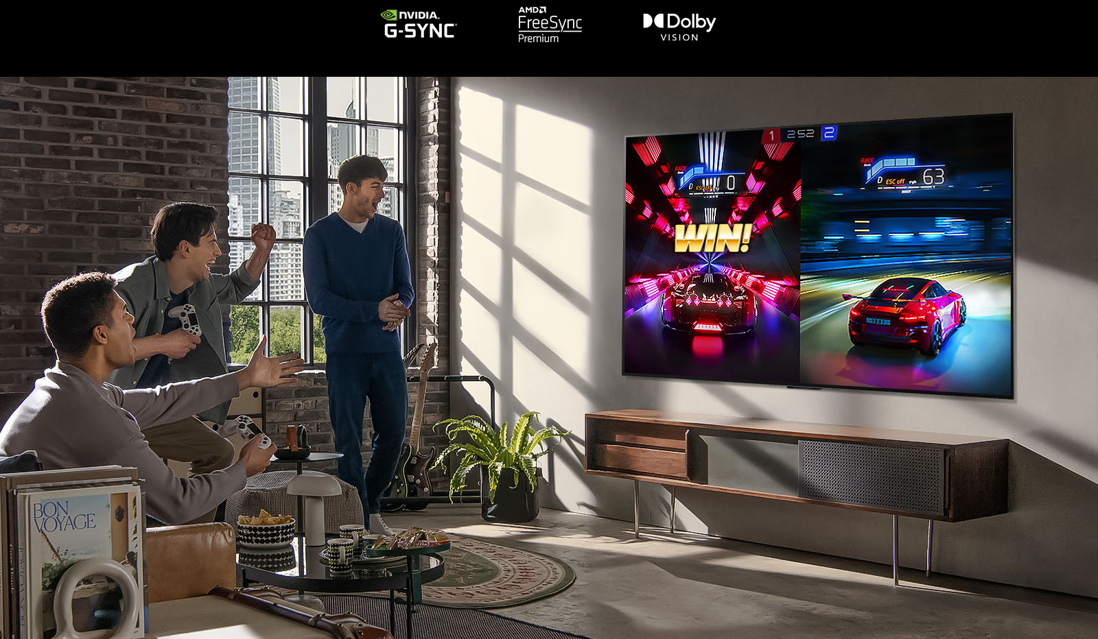 Photo of three people playing a racing game on an LG OLED TV in a modern city apartment.