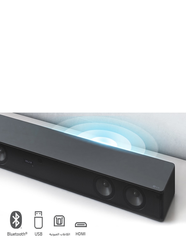 LG Sound Bar is on the white shelf. The Sound graphic coming out from the speaker. LG logo is shown on the right corner of the sound bar. It shows Bluethooth, USB, Optical, and HDMI icons.