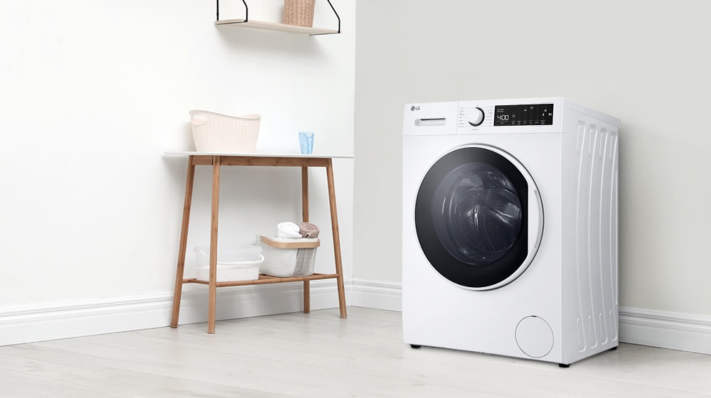 a washing machine in the laundry room