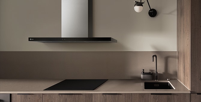 This is an image of LG built-in induction hob and hood installed in the kitchen.