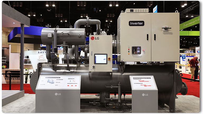 LG's chiller system with inverter unit displayed at trade show, featuring advanced HVAC technology and control panels.