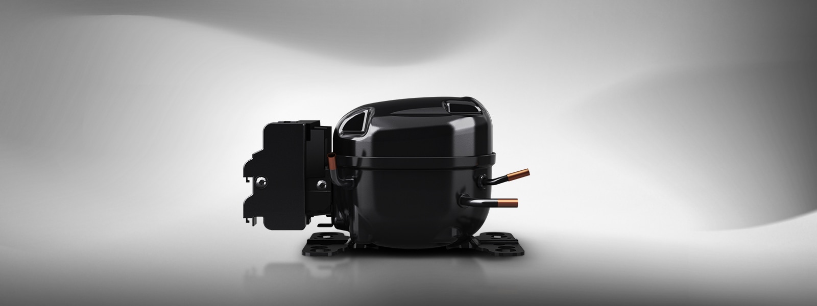 LG's variable speed reciprocating compressor in black with metallic accents is highlighted under lighting.