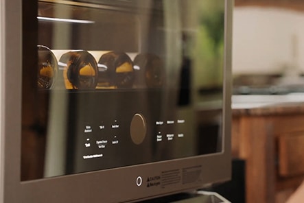 Close shot of LG SIGNATURE Wine Cellar's led glass touch display panel.