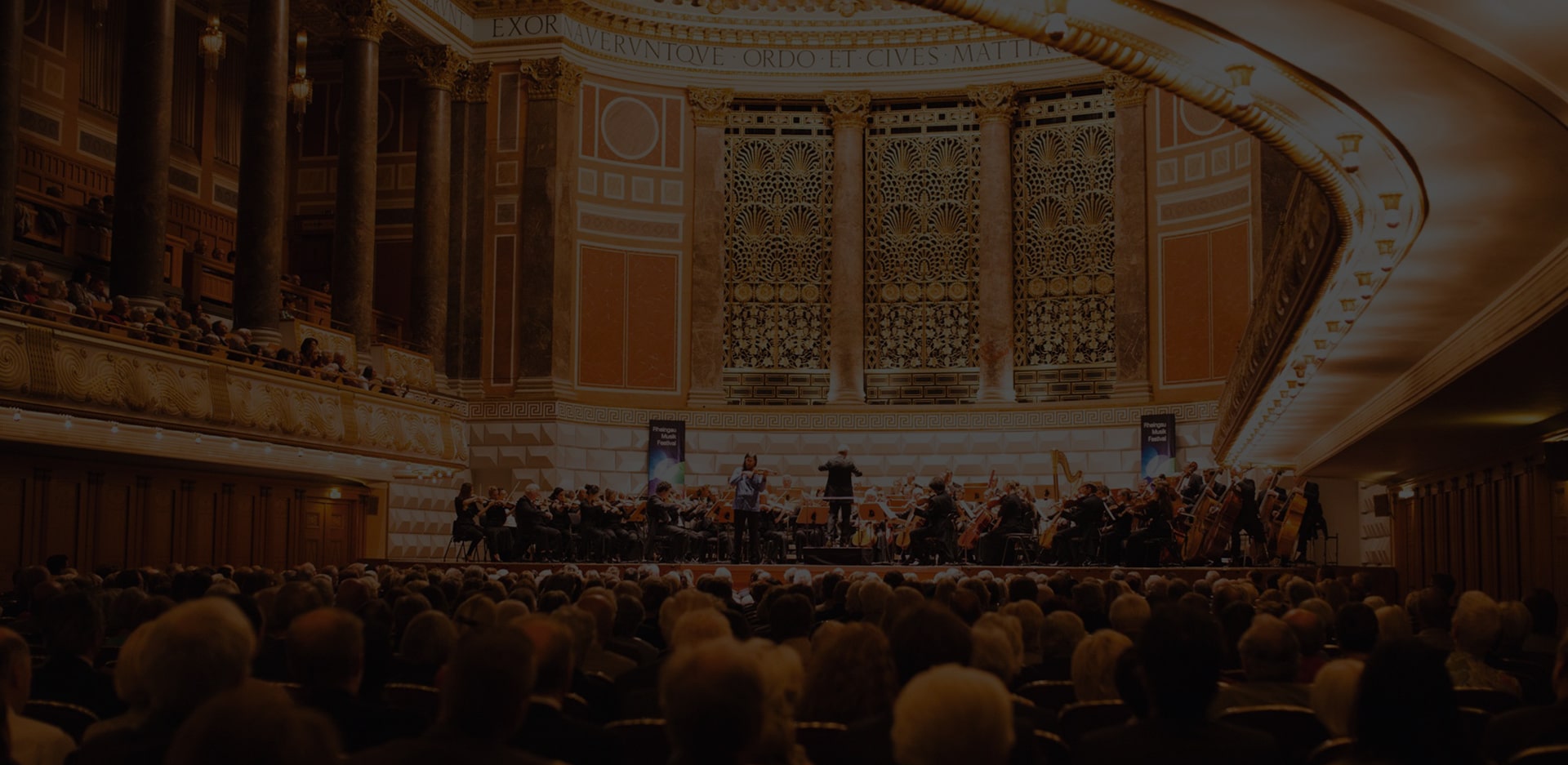 An orchestra performing at the Kurhaus during the Rheingau Musik Festival.