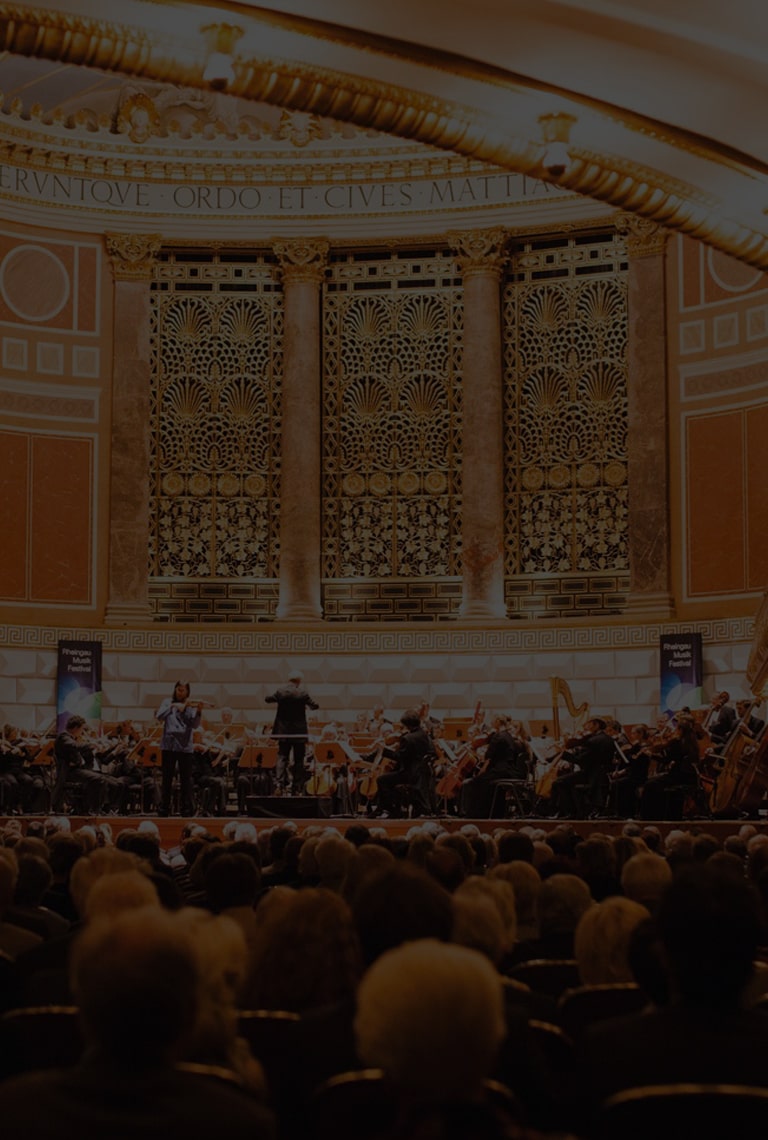 An orchestra performing at the Kurhaus during the Rheingau Musik Festival.