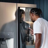 Thumbnail of Lewis Hamilton knocking on the LG SIGNATURE Refrigerator instaview door. (play the video)