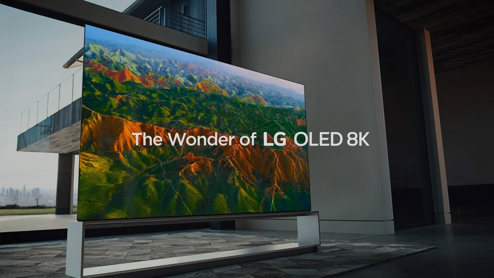 Side view of LG SIGNATURE OLED TV Z9 with the screen filled with wide and broad mountain range