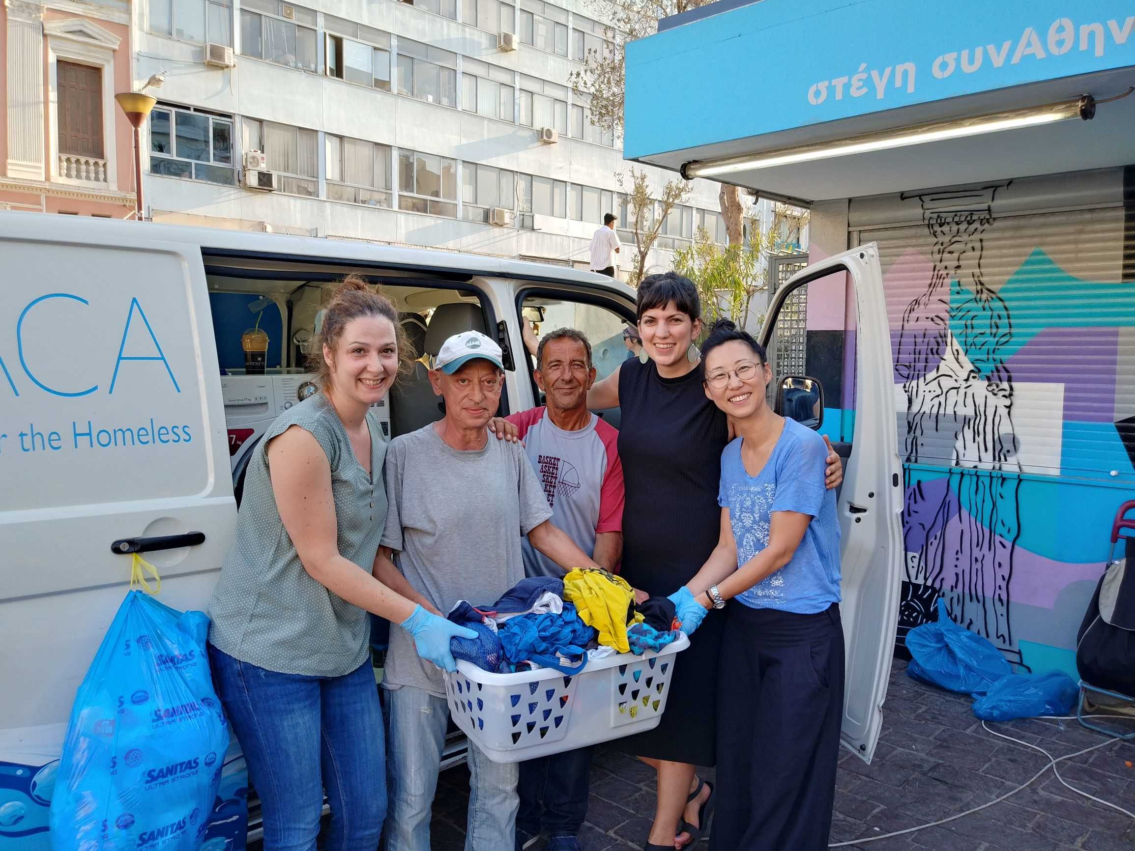 LG employees volunteer at Ithaca laundry - Photo 1.JPG