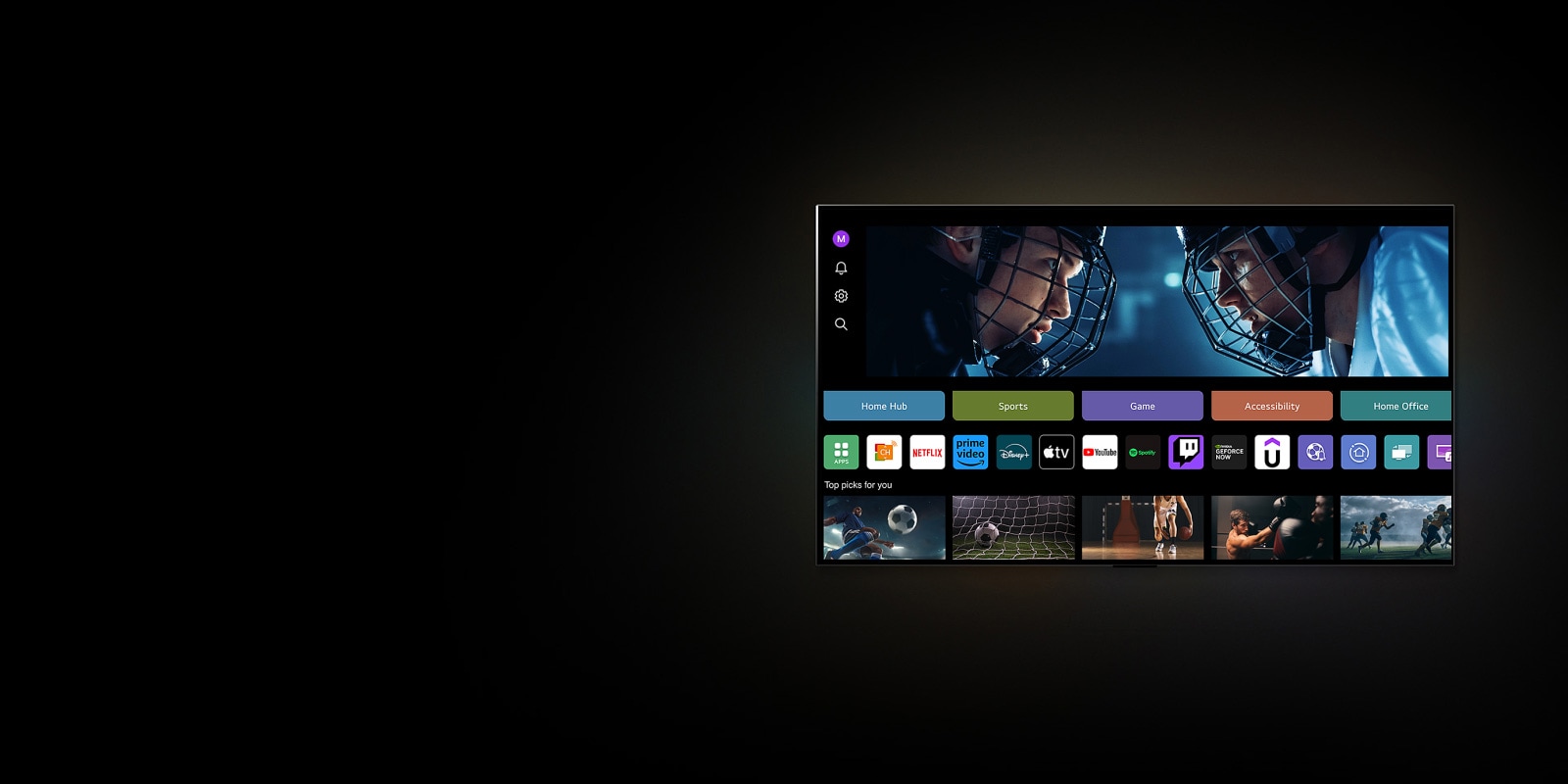 تعرض شاشة تلفزيون LG TV شاشة My Profile. في الثلث الأعلى، تظهر لافتة "Tangible Wonders". وتظهر أسفل اللافتة الأزرار التالية: Home Hub، وSports، وGame، وAccessibility، وHome Office. وتظهر أسفل الأزرار الشعارات التالية: LG Channels، وNetflix، وPrime Video، وDisney+، وApple TV، وYouTube، وSpotify، وTwitch، وGeForce Now، وUdemy. أسفل الشعارات، تظهر 5 صور مصغرة لأفلام تحت عبارة "Top picks for you". ينقر المؤشر على حرف "S" الأوّلي في الزاوية العلوية اليسرى. تفتح القائمة المنسدلة لحساب LG وتظهر خمسة أسماء. ينقر المؤشر على الاسم الثاني لتتغير الصور المصغرة والمحتويات الموصى بها على الشاشة.