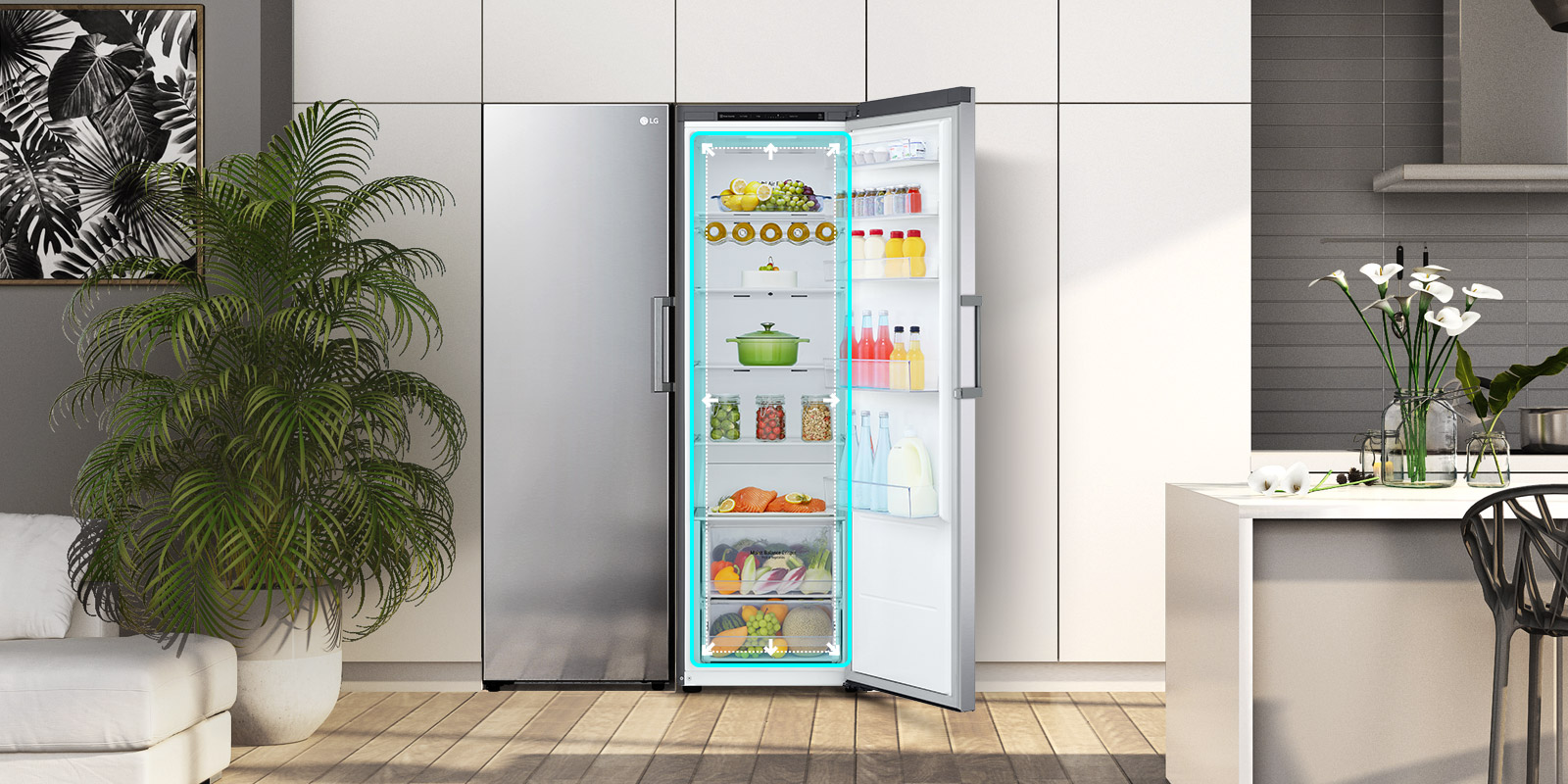 The front view of the fridge is shown in a kitchen with the door open and displaying the produce inside.