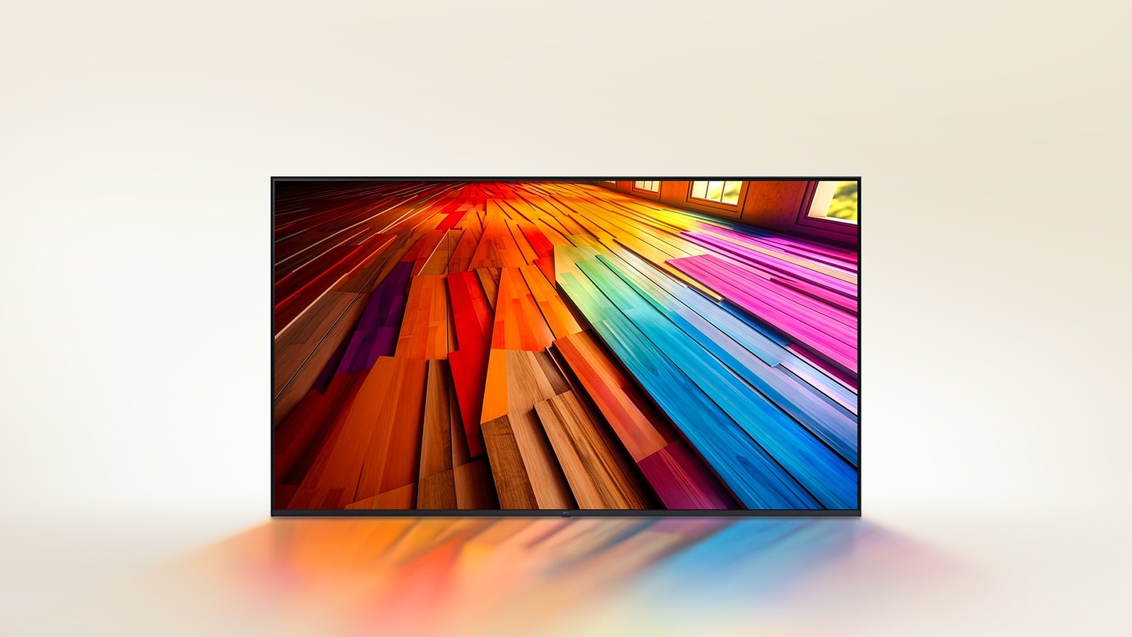 Un long parquet en bois dur aux couleurs vives est affiché sur un téléviseur LG UHD.