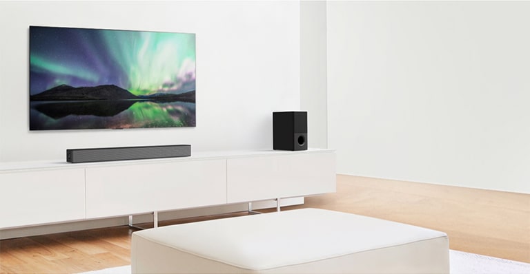 Video preview showing LG Soundbar in a white living room with 4.1 channel setup. 