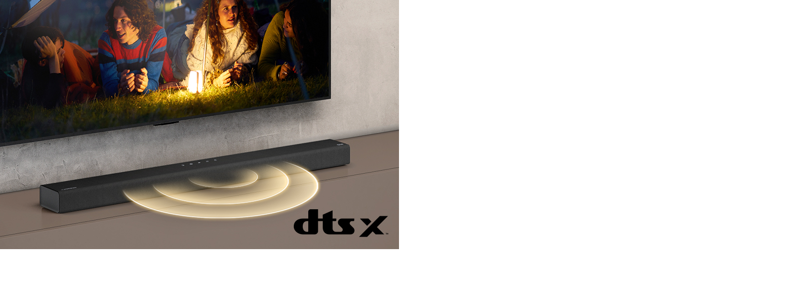 LG TV is on the wall, on the screen it shows 2 couples lying on the grass. In front of them, there is a lamp. LG Sound bar is below LG TV. Sound graphic is coming out from the front of the sound bar. DTS Virtual:X logo is shown on the bottom right corner of image.