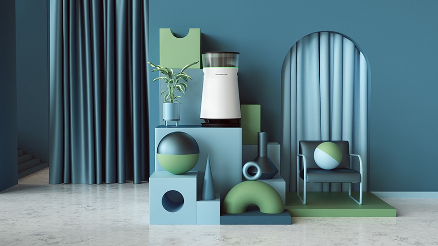 Установленный на живописном возвышении очиститель воздуха LG SIGNATURE с декоративными элементами в зеленых тонах.