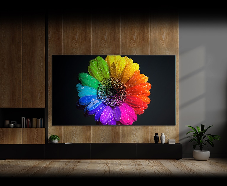 Les voyants Mini LED à l’intérieur du téléviseur s’allument et remplissent tout l’écran du téléviseur et se transforment en une fleur très colorée sur le téléviseur à la fin.