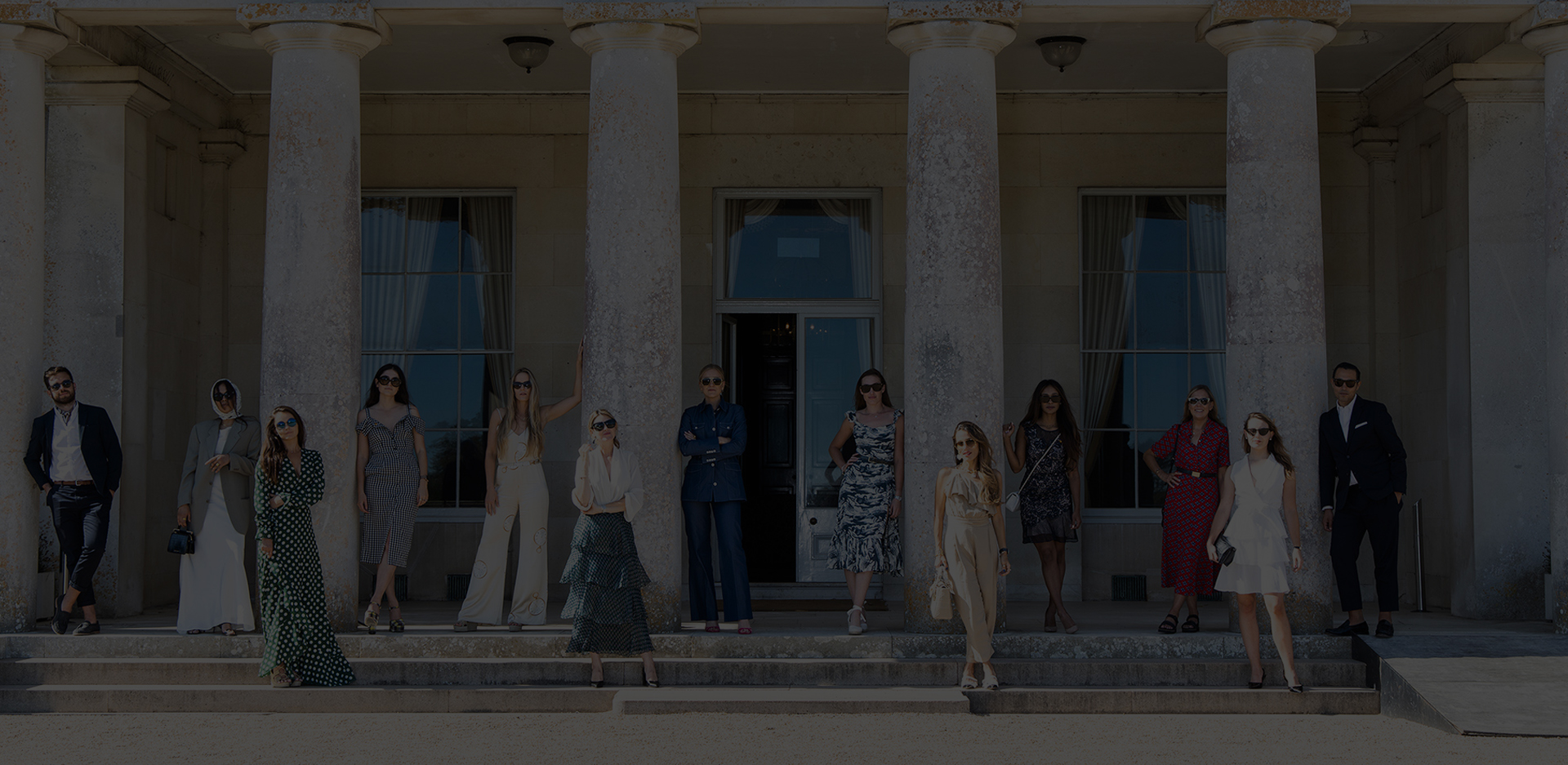 Stylish models try to recreate an iconic photo from the 1800s on the front steps of Goodwood House.