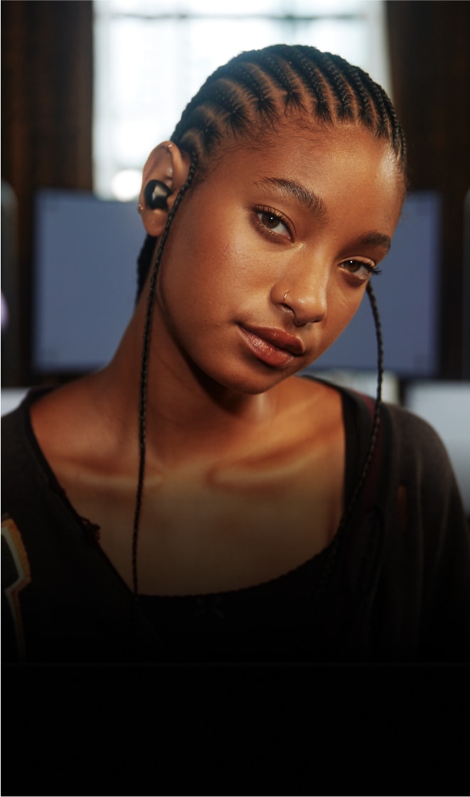 Willow Smith wearing LG Wireless Earbuds