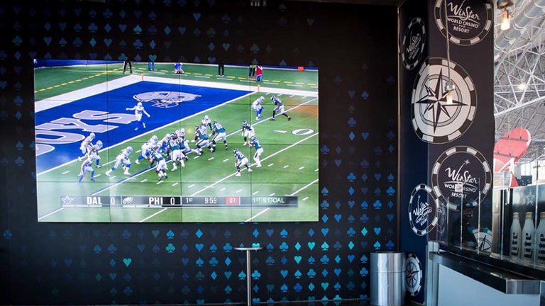 How big is the Dallas Cowboys' massive screen in AT&T Stadium? 