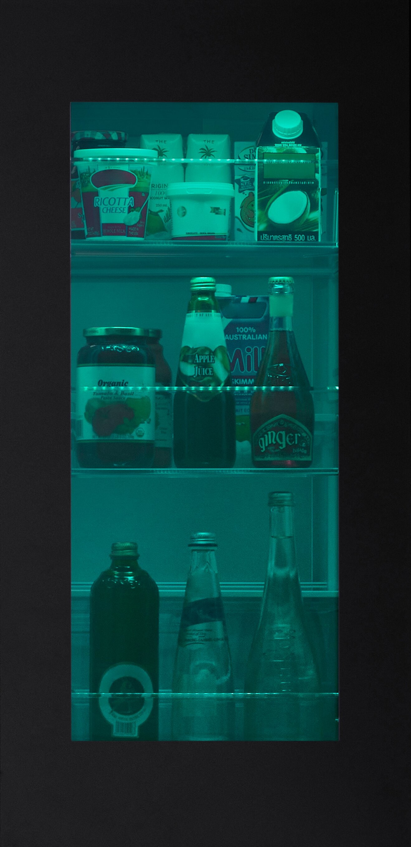 Close-up view of the LG InstaView® MyColor™ Refrigerator with vibrant LED color