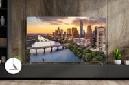 Luxury living room view of LG TV with city landscape on screen