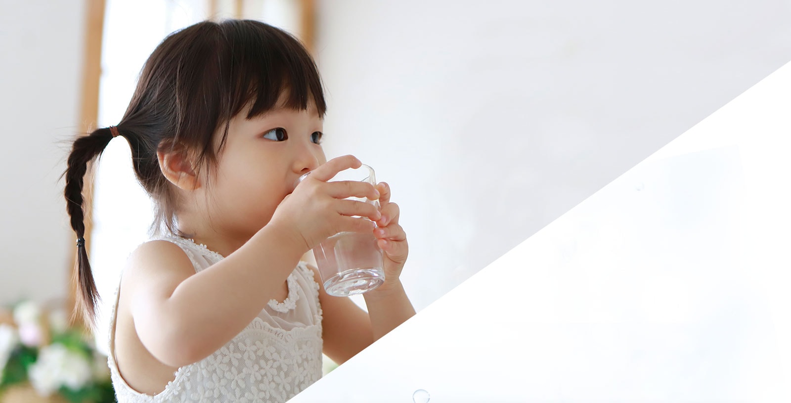 little girl drinking water