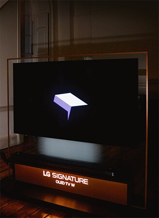 LG SIGNATURE OLED TW W is placed on the wood floor