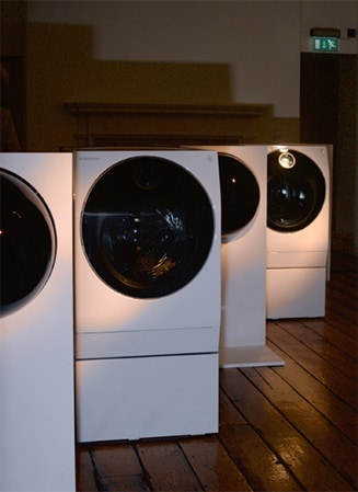 LG SIGNATURE Washing Machines are placed on the wood floor