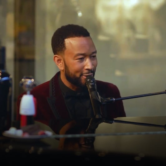 A preview video of John Legend's mini concert, a part of the private dinner event.