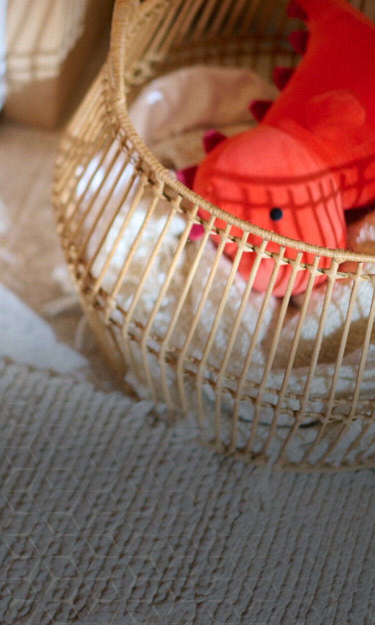 LG Studio image featuring a stylish laundry basket with a plush toy and caption 'Make laundry day feel good'