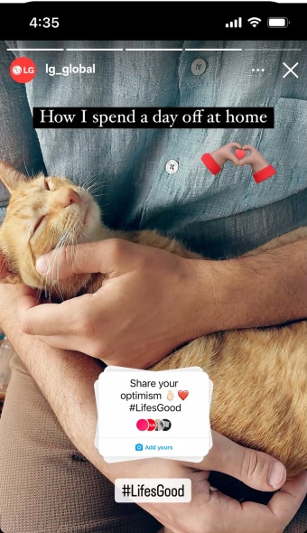 Cuddling a content, sleeping orange cat.