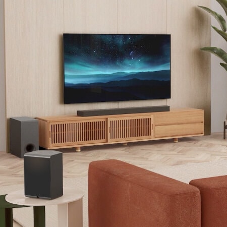 LG Soundbar in living room with subwoofer and rear speaker set up