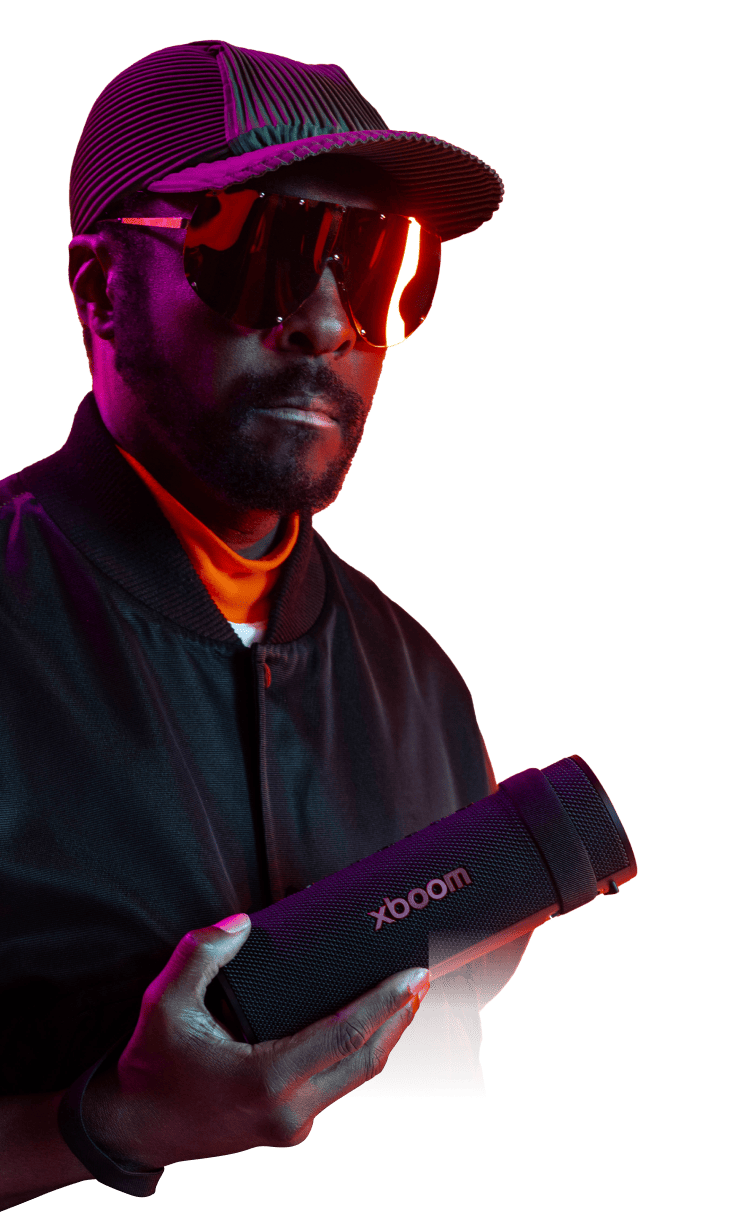 Will.i.am holiding an xboom speaker