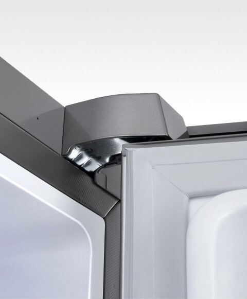 Close-up of the Zero Clearance hinge at the top of the refrigerator door.