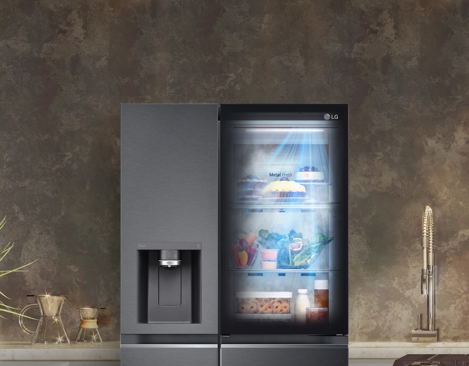 The front view of a black InstaView refrigerator with the light on inside. The contents of the refrigerator can be seen through the InstaView door. Blue rays of light shine down over the contents from the DoorCooling function.